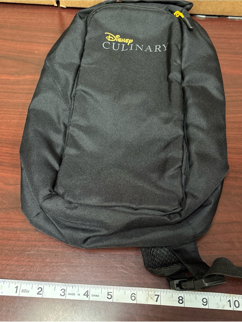 Disney Culinary Cast Member Black Orange Sling Bag Backpack Shoulder Tote New - Picture 7 of 7